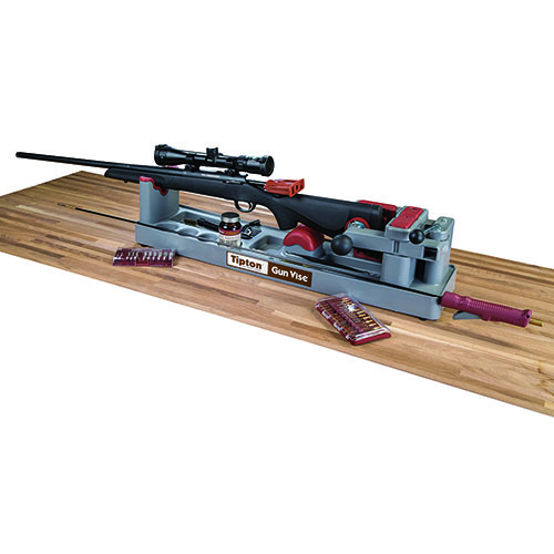 Säkra din bössa med Tipton Gun Vise – perfekt för rengöring och vapensmide, med gummiyttermaterial, snabbkoppling och förvaringsfack för smådelar.