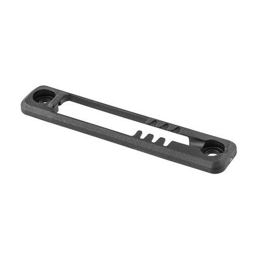 M-LOK Tape Switch Mounting Plate från MAGPUL erbjuder säker montering av Surefire ST tryckpads med låg profil, robust konstruktion och snag-free ytor.